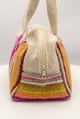 Cartera de mano de lana de oveja con rombos fucsia y asas crema